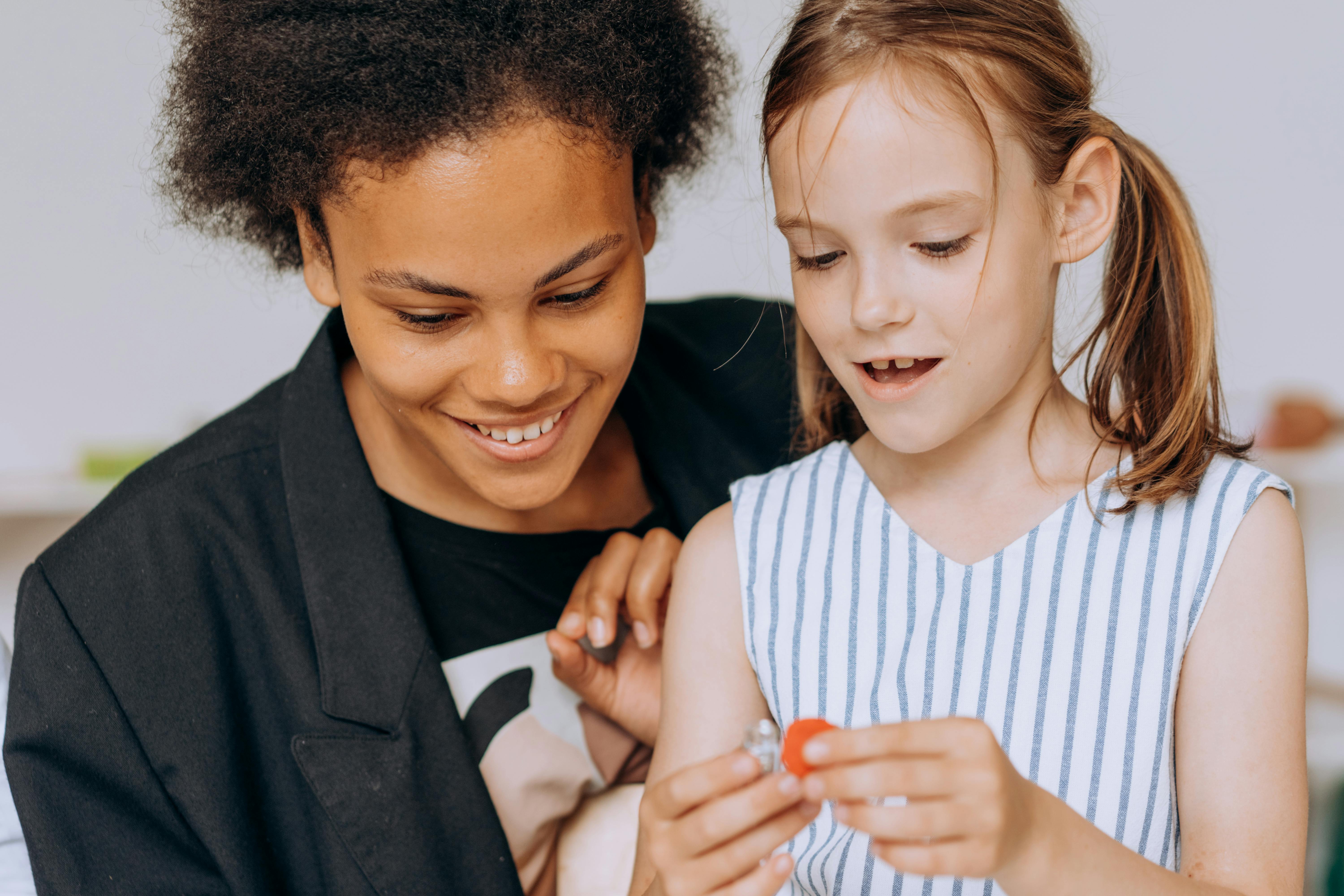 "women in blazer with child"