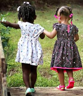 two young girls walking together