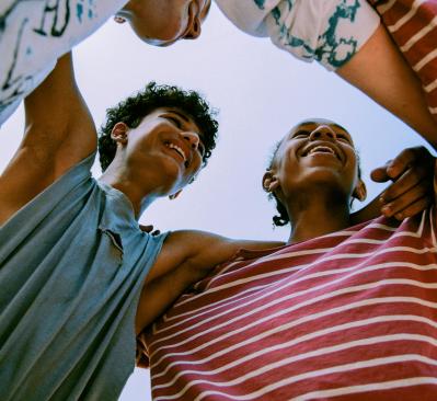 young men embracing